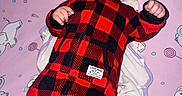 Summer joined the competition — help win amazing prizes! baby, baby_clothing, barefoot, black, blanket, bundled_up, child, elephant_pattern, hood, indoors, infant, looking_away, lying_down, mattress, pink, plaid, portrait, quilted, red, snowsuit