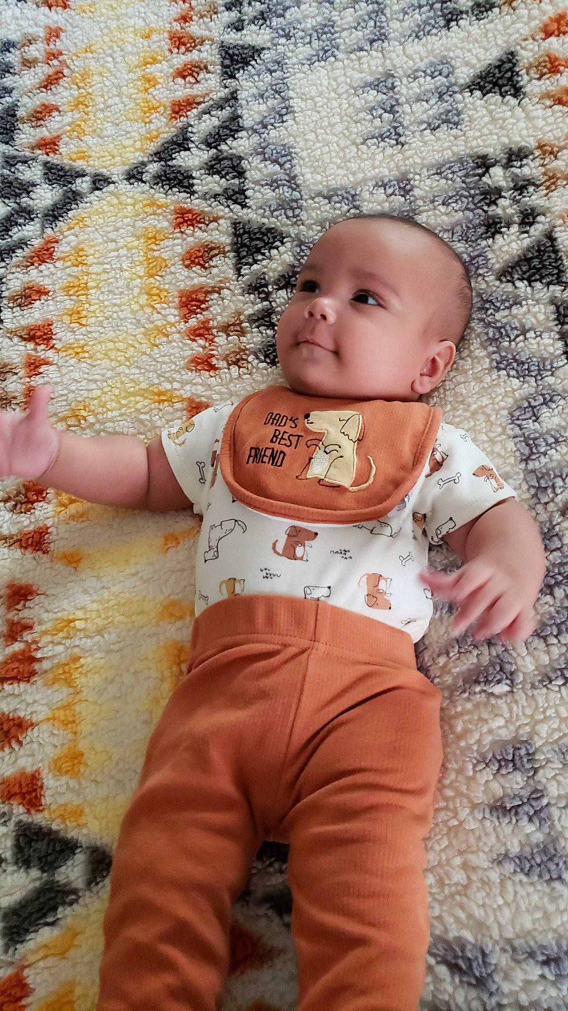 Castiel is registered to the contest to win money with this photo: abdomen, arm, baby, baby_toddler_clothing, chest, hand, happy, human_body, orange, people_in_nature, person, pink, skin, sleeve, standing, stomach, textile, toddler, trunk, waist