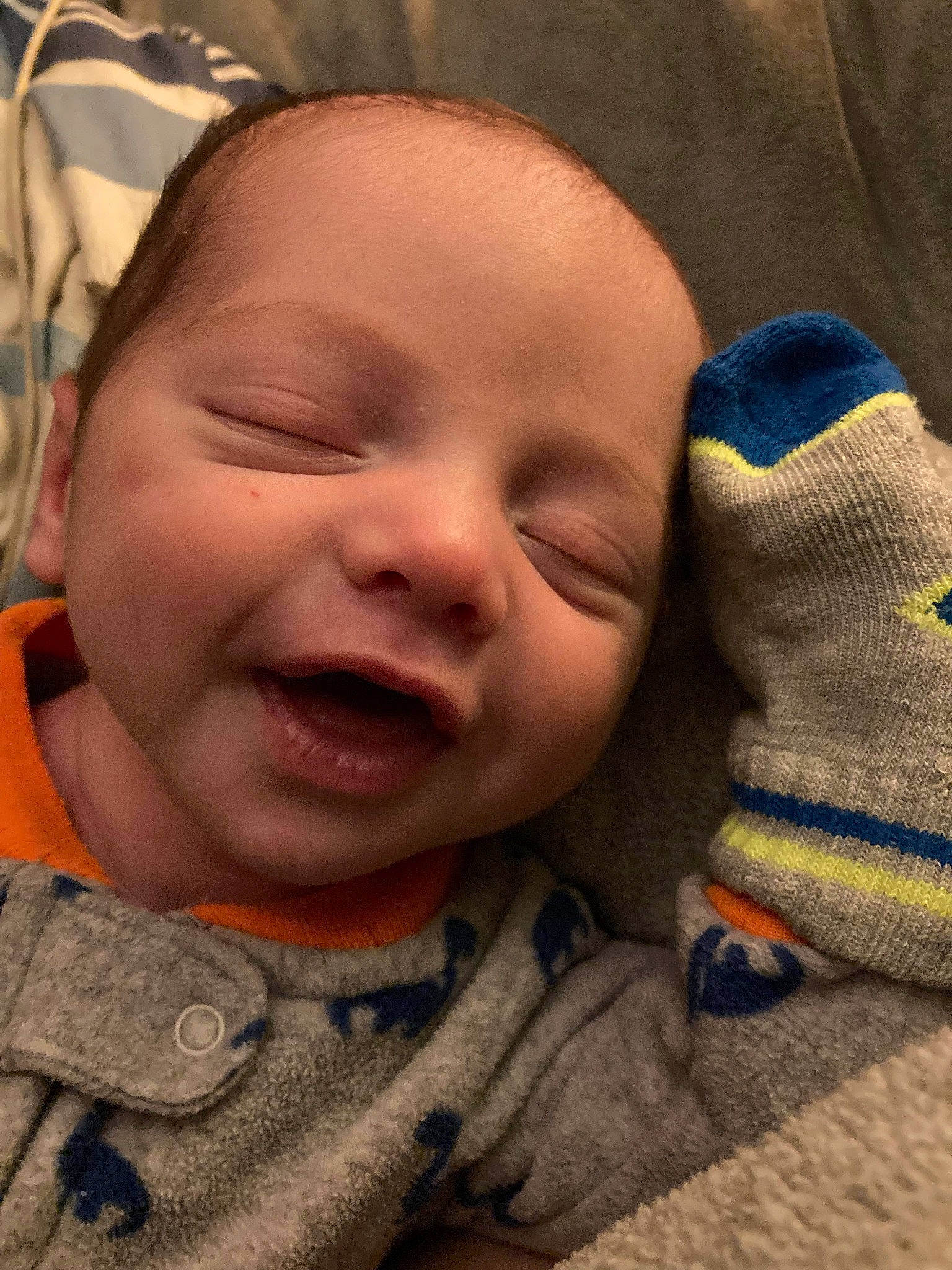 Tate is registered to the contest to win money with this photo: baby, cheek, chin, comfort, eye, eyebrow, finger, forehead, gesture, happy, head, iris, lip, mammal, mouth, nose, person, skin, smile, textile