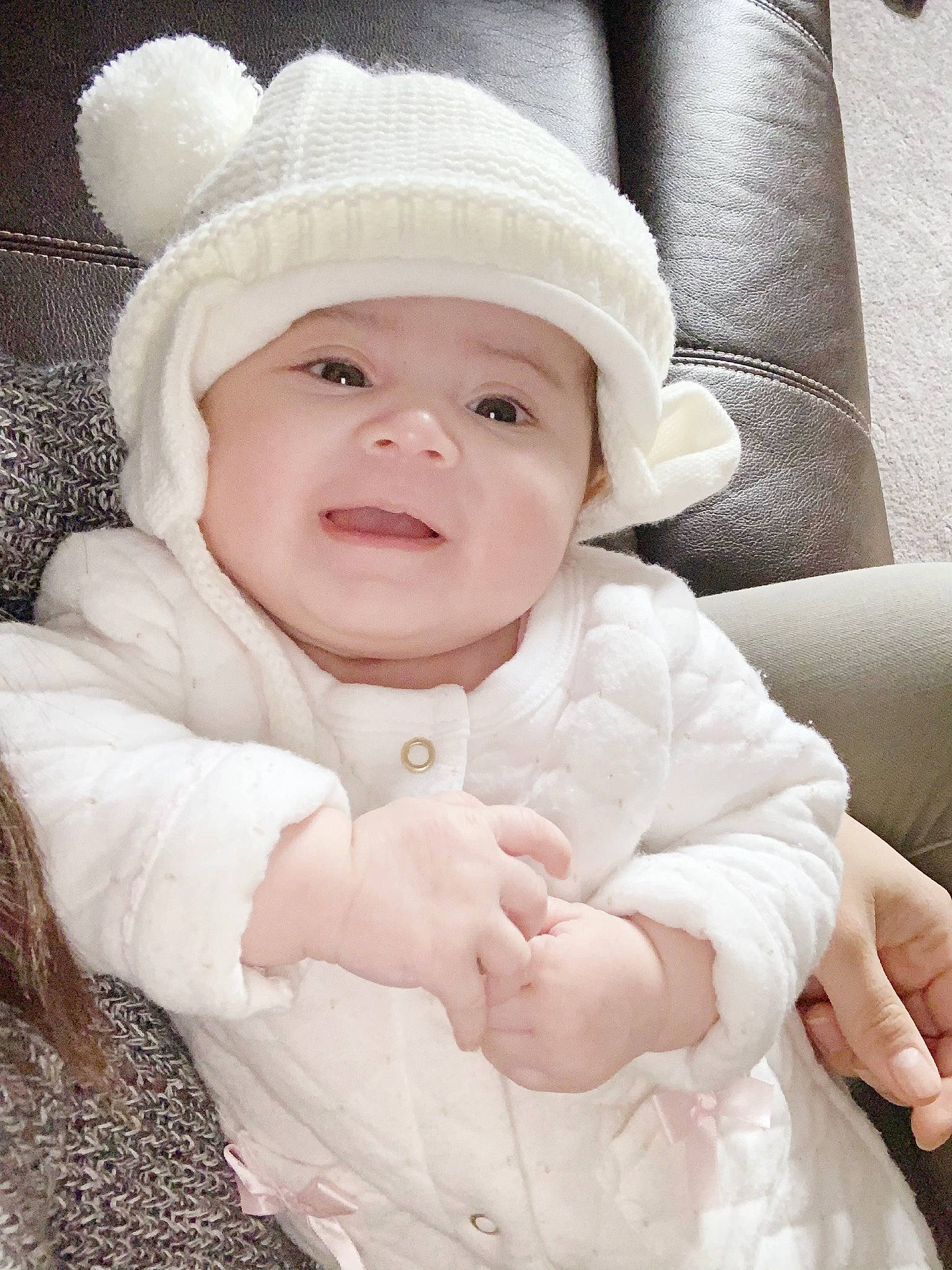 Marissa joined the competition — help win amazing prizes! baby, cheek, child, eye, face, fur, gesture, hat, headgear, headwear, person, skin, smile, toddler