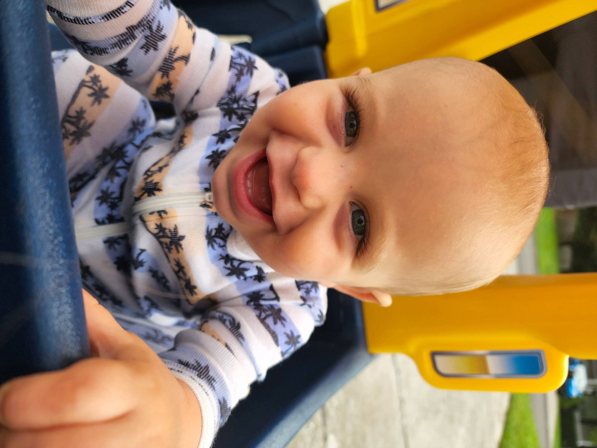 Holden joined the competition — help win amazing prizes! baby, baby_laughing, cheek, chin, face, facial_expression, finger, gesture, hand, happy, human_body, mouth, nose, organ, person, product, skin, sleeve, smile, toddler