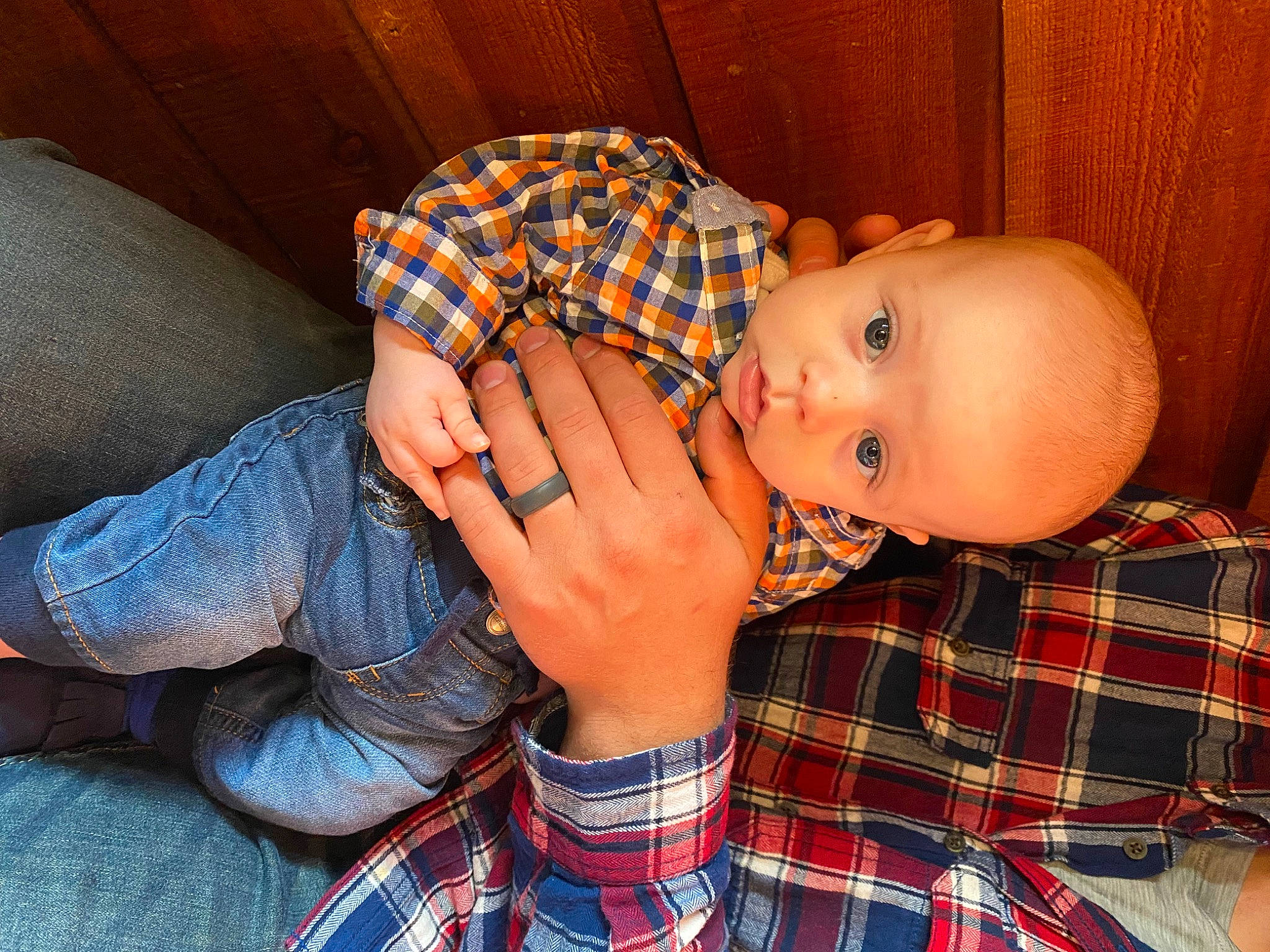 Holden joined the competition — help win amazing prizes! baby, baby_toddler_clothing, comfort, elbow, eye, finger, gesture, human_body, lip, mouth, nail, nose, orange, pattern, person, plaid, skin, tartan, textile, thumb