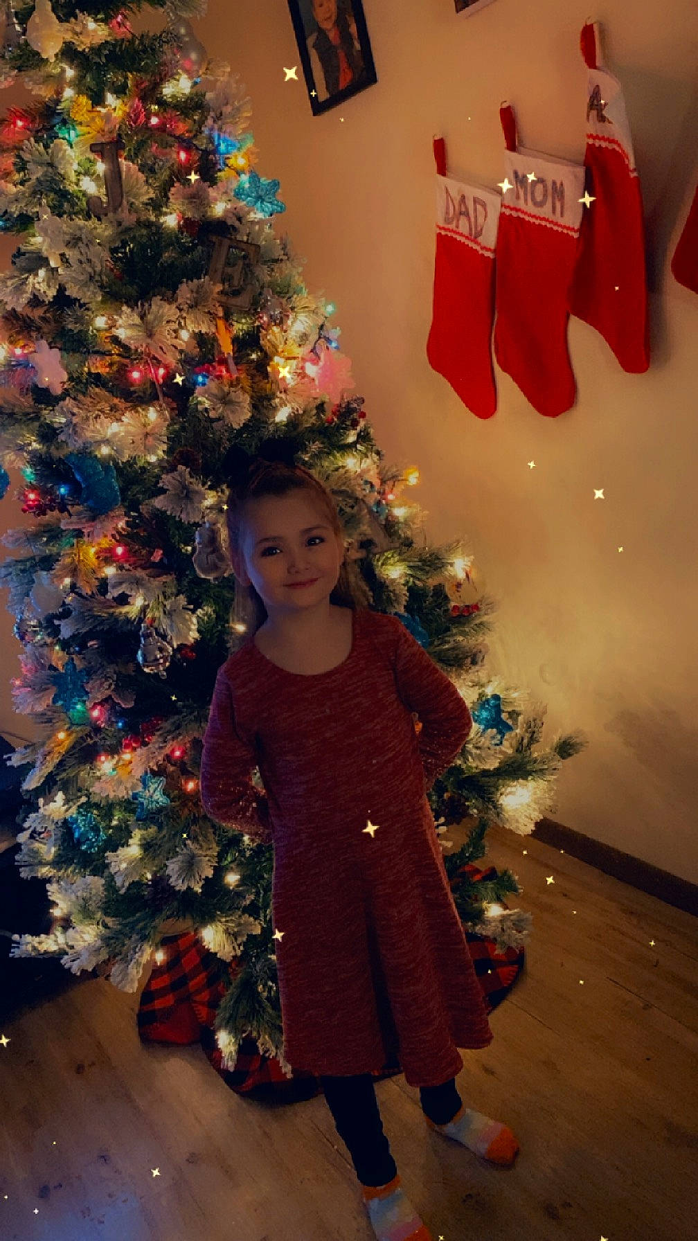 Annabelle is registered to the contest to win money with this photo: beauty, christmas, christmas_decoration, christmas_ornament, christmas_tree, event, evergreen, fun, happy, holiday, holiday_ornament, human_body, joy, lighting, ornament, people, person, photograph, snapshot, standing