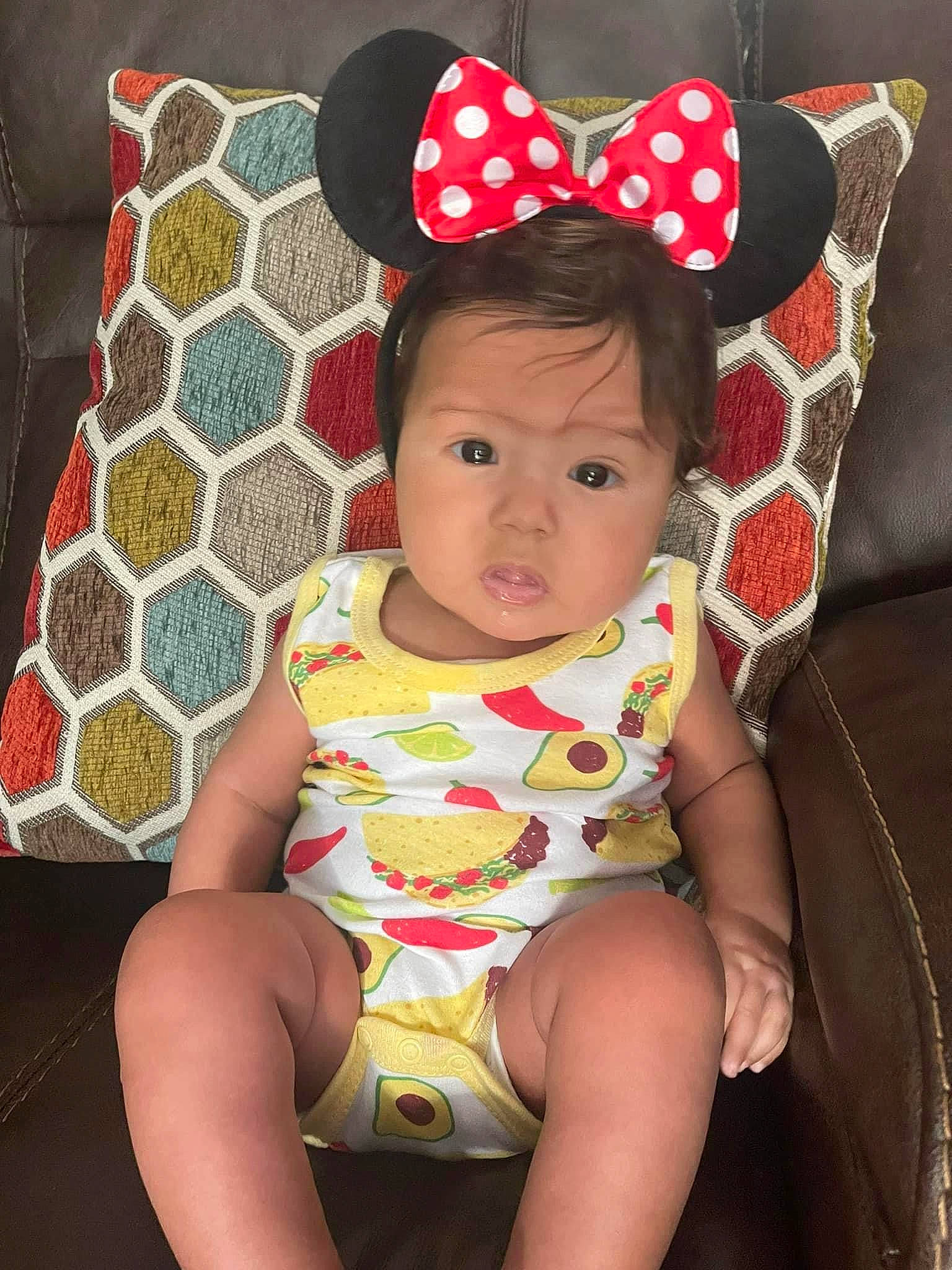 Addison joined the competition — help win amazing prizes! baby, baby_toddler_clothing, cap, cheek, comfort, costume_hat, eye, happy, head, headgear, lap, lip, neck, organ, pattern, person, pink, skin, sun_hat, thigh