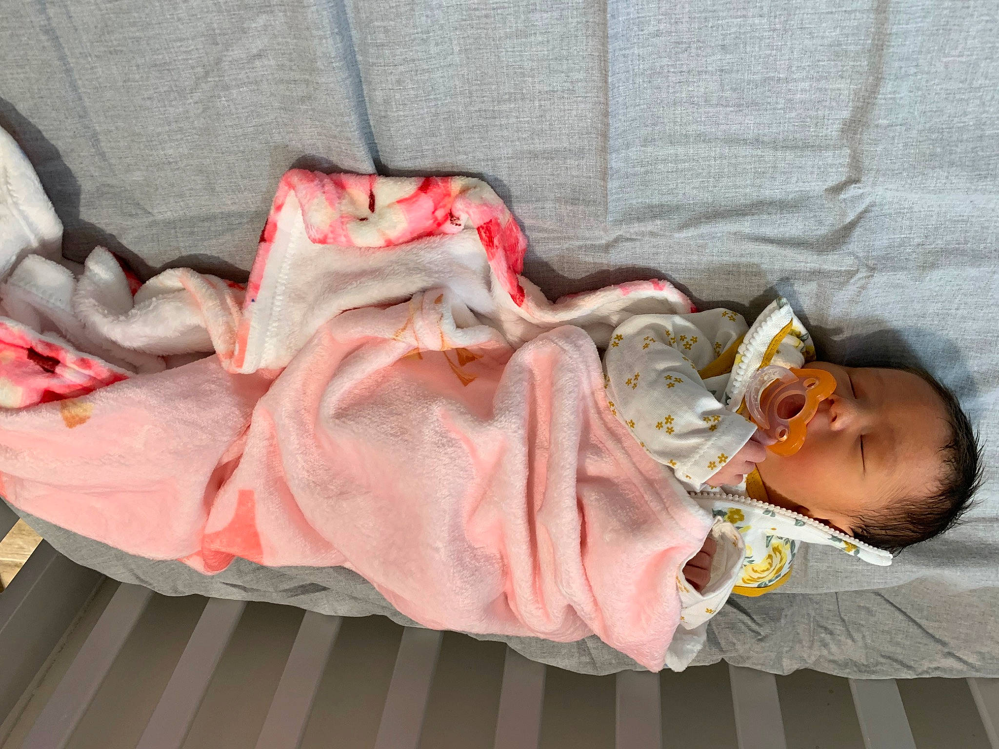 Addison is registered to the contest to win money with this photo: baby, baby_products, baby_toddler_clothing, carmine, child, comfort, flesh, fur, linens, peach, person, sitting, toddler