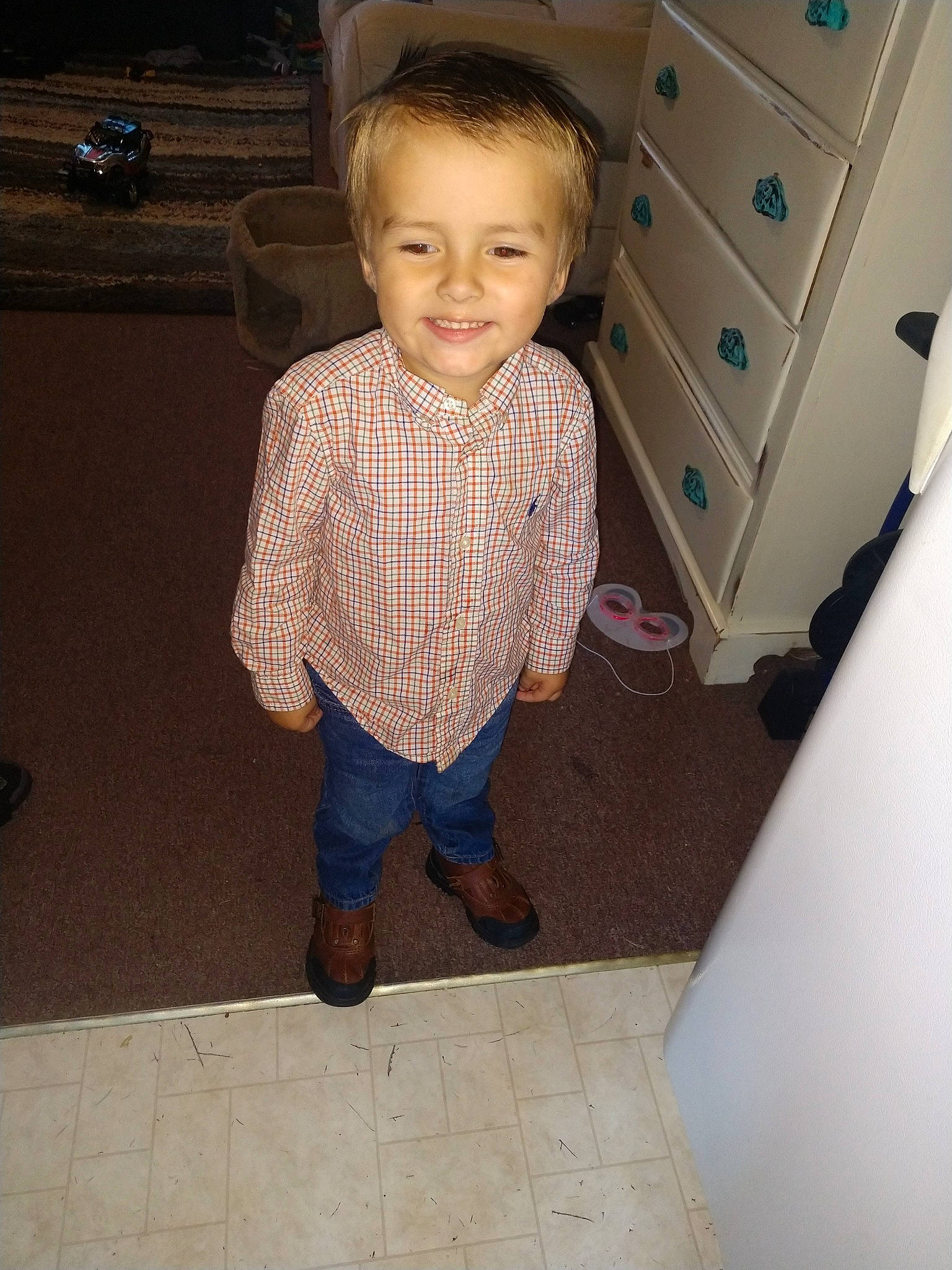 Benji is registered to the contest to win money with this photo: child, floor, flooring, head, joy, person, skin, standing, toddler