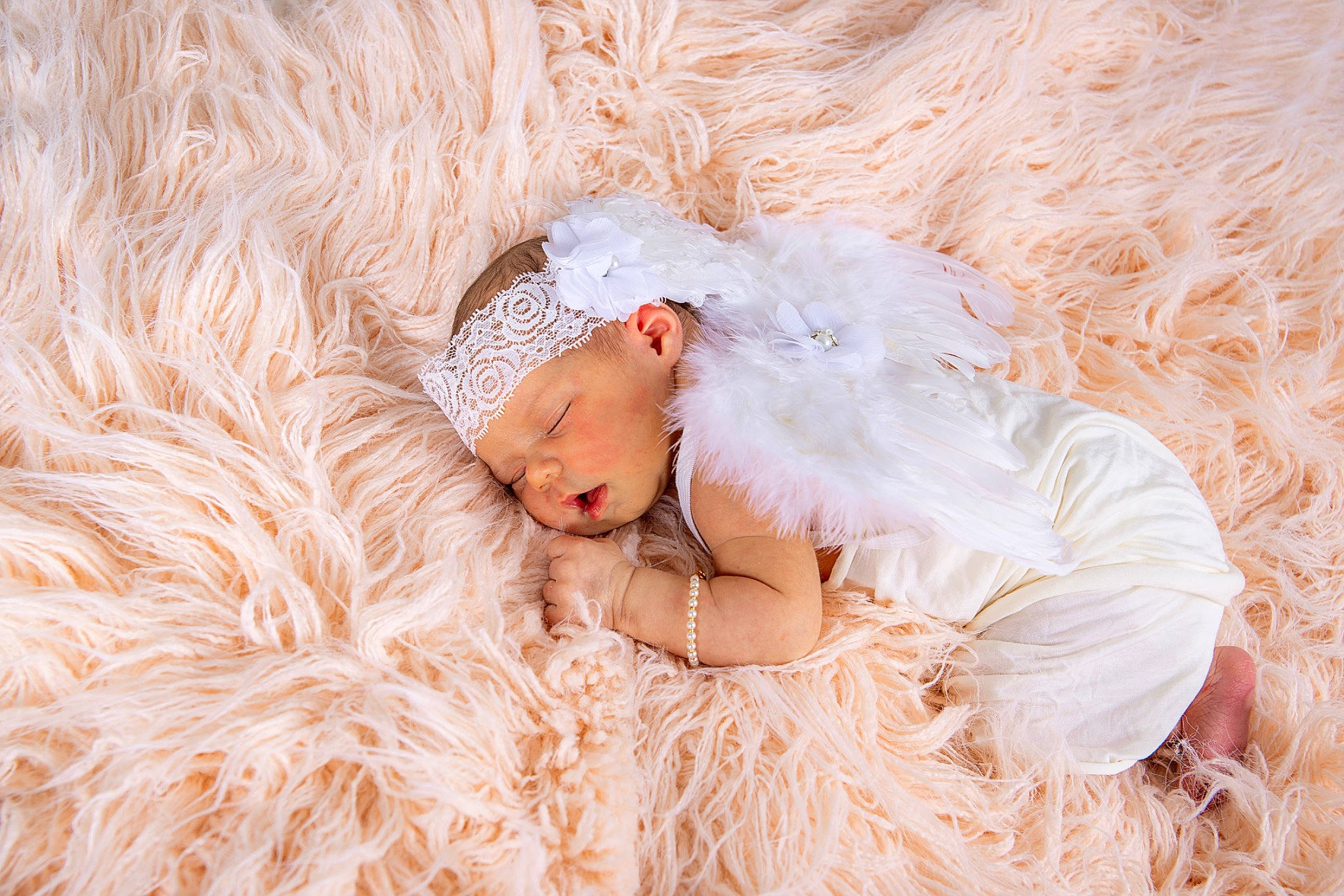 Harley is registered to the contest to win money with this photo: baby, baby_toddler_clothing, child, comfort, dress, eye, fashion_accessory, fur, grass, happy, hat, headwear, linens, pattern, peach, people_in_nature, person, portrait_photography, sitting, sleep