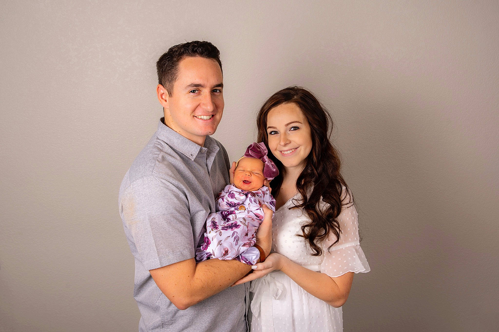 Harley is registered to the contest to win money with this photo: baby, cheek, child, comfort, event, family_taking_photos_together, flash_photography, formal_wear, fun, gesture, happy, hug, iris, joy, love, person, portrait_photography, shoulder, skin, sleeve