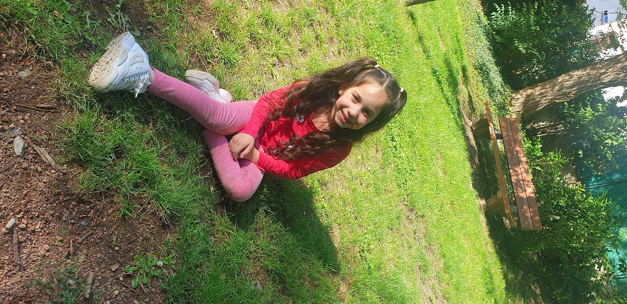 Kelly participe au concours pour gagner de l'argent avec cette photo : dress, fun, grass, grassland, happy, human_leg, joy, knee, landscape, lawn, leisure, meadow, people_in_nature, person, plant, recreation, shorts, shrub, smile, soil