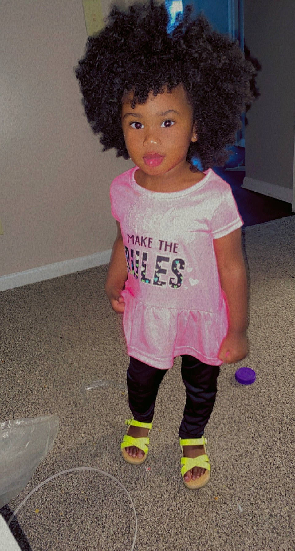 Aniya joined the competition — help win amazing prizes! active_pants, afro, baby_toddler_clothing, cheek, child, clothing, face, hair, head, jheri_curl, lip, magenta, outerwear, person, pink, ringlet, sleeve, t_shirt, toddler, wig