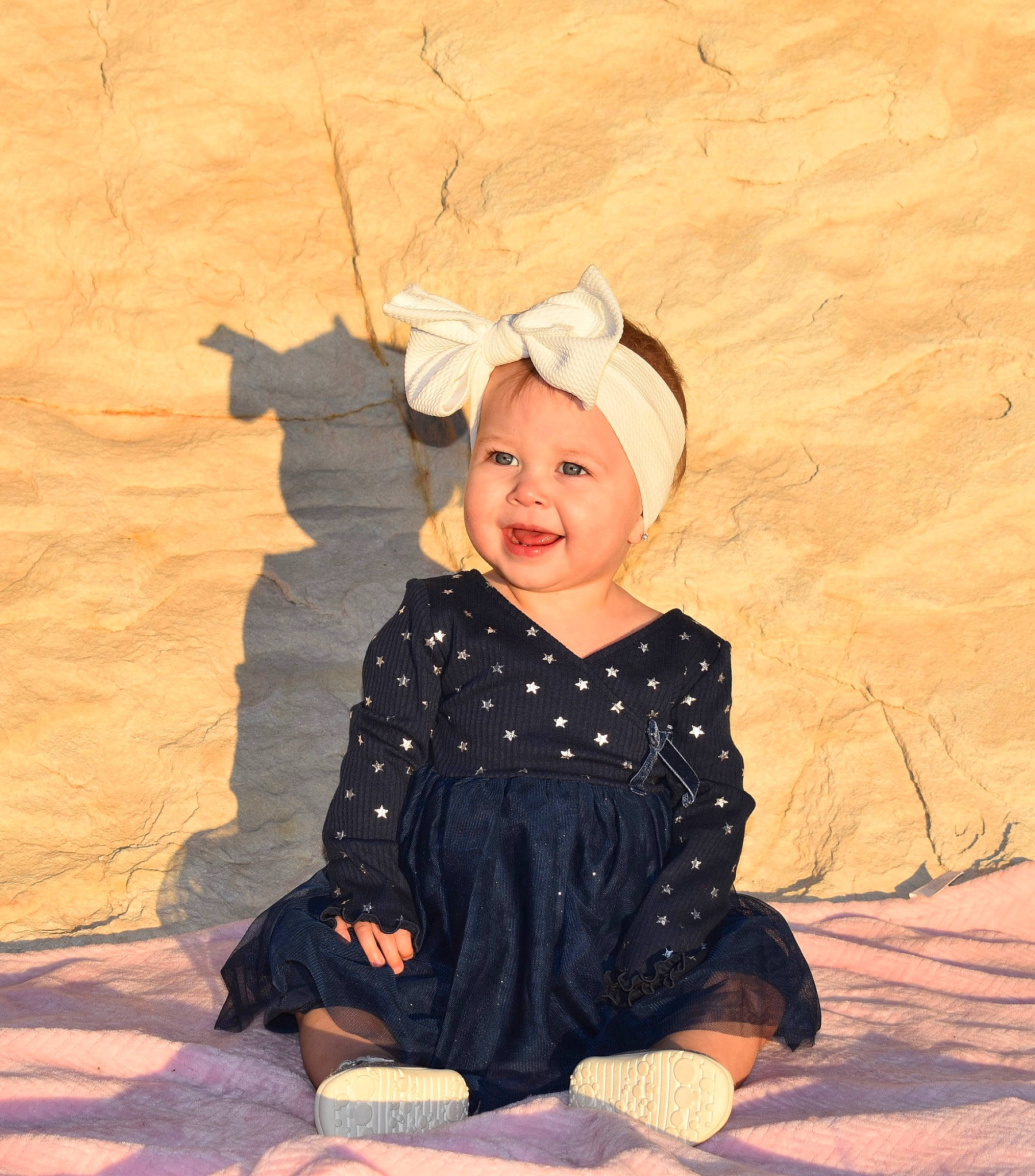 Gianna joined the competition — help win amazing prizes! art, baby_toddler_clothing, child, embellishment, fashion_accessory, flash_photography, fun, happy, headgear, headwear, landscape, pattern, people_in_nature, person, photograph, shadow, sitting, sleeve, smile, tints_and_shades