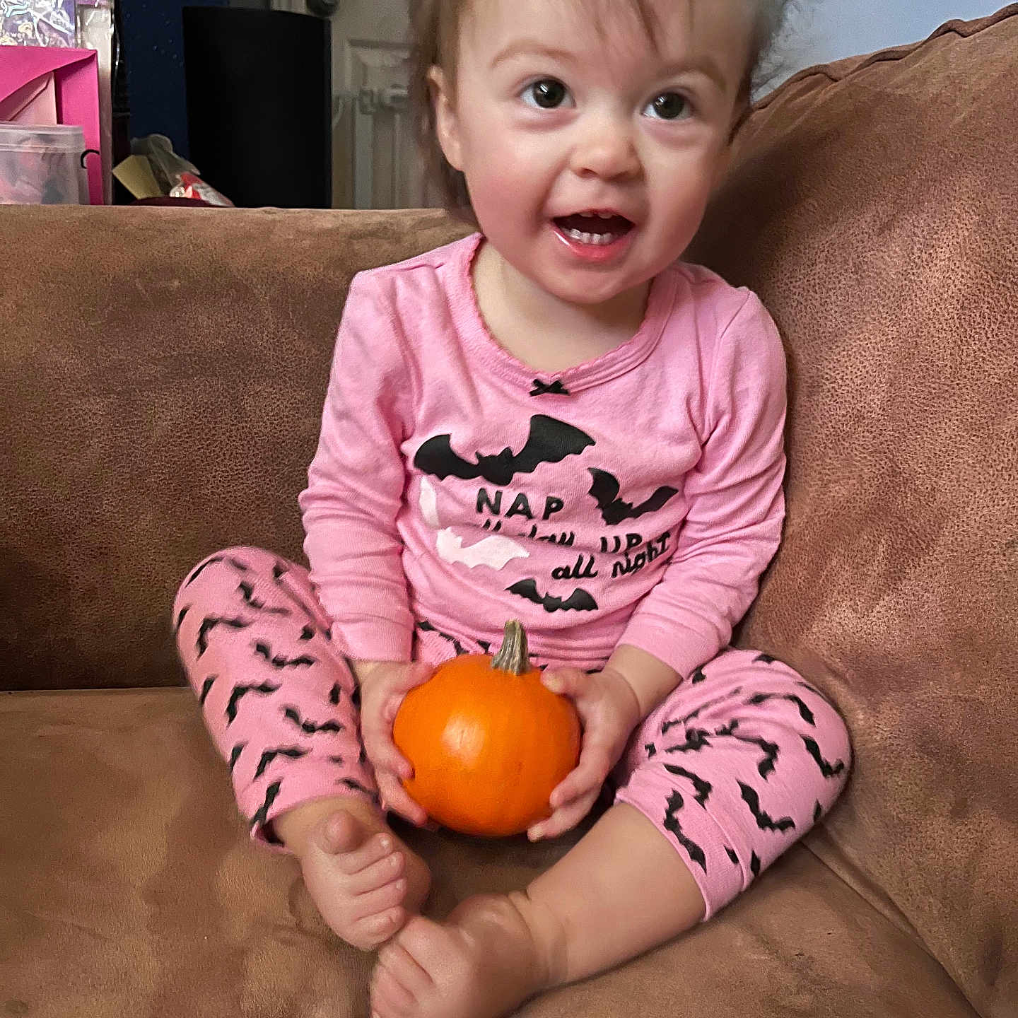 Aria joined the competition — help win amazing prizes! baby, bodypart, clothing, couch, face, finger, food, furniture, hand, happy, head, person, photography, plant, portrait, produce, pumpkin, sitting, squash, vegetable
