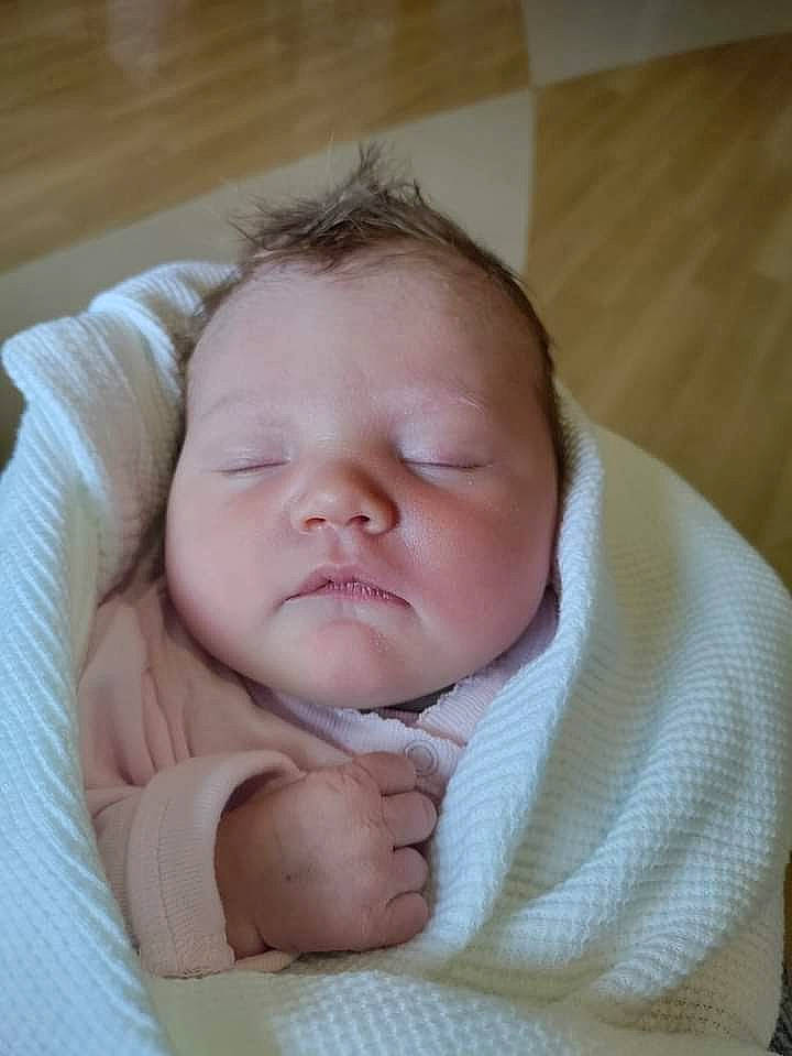 Isabella is registered to the contest to win money with this photo: baby, baby_sleeping, baby_toddler_clothing, bedtime, cheek, child, comfort, eyebrow, eyelash, face, iris, linens, nap, nose, person, portrait_photography, room, sleep, sleeve, thumb