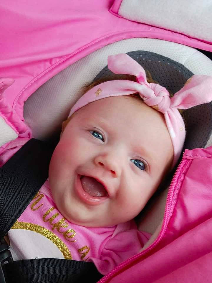 Isabella joined the competition — help win amazing prizes! baby, baby_carriage, baby_products, baby_toddler_clothing, beauty, cheek, child, comfort, fashion_accessory, fun, happy, headgear, headwear, magenta, person, pink, product, purple, skin, smile