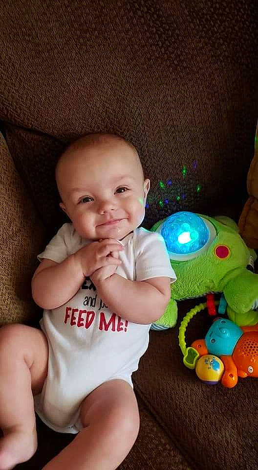 Benjaman is registered to the contest to win money with this photo: baby, baby_playing_with_toys, baby_toys, cheek, child, eye, fun, person, play, sitting, skin, smile, toddler