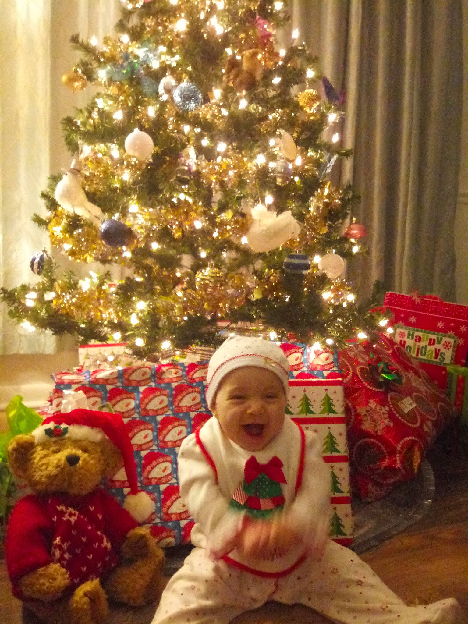 Gianella joined the competition — help win amazing prizes! child, christmas, christmas_decoration, christmas_eve, christmas_lights, christmas_ornament, christmas_tree, conifer, event, fir, headwear, holiday, holiday_ornament, home, interior_design, person, plant, room, spruce, toddler