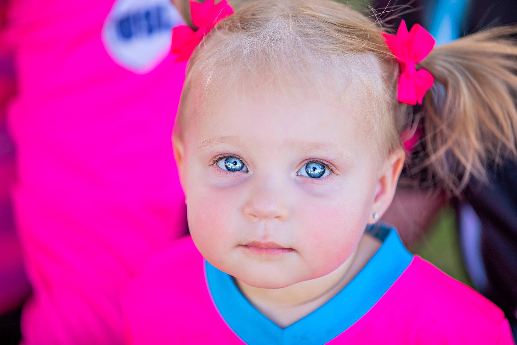 Brooklyn is registered to the contest to win money with this photo: baby, baby_toddler_clothing, cheek, chin, eye, eyebrow, eyelash, face, grass, hair, hairstyle, happy, headgear, iris, lip, nose, person, pink, skin, toddler
