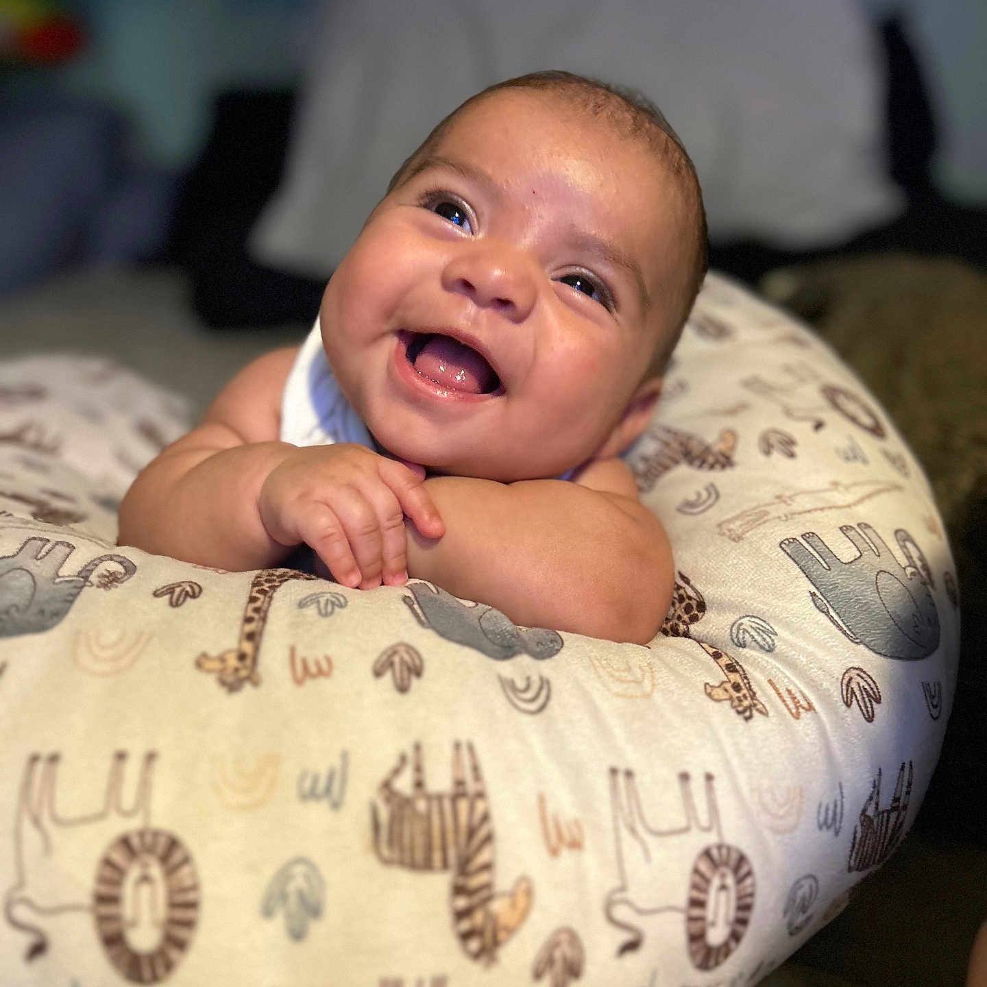 Jose joined the competition — help win amazing prizes! baby, babylaughing, bodypart, cushion, face, finger, furniture, hand, happy, head, homedecor, laughing, mouth, newborn, person, photography, pillow, portrait, quilt, smile