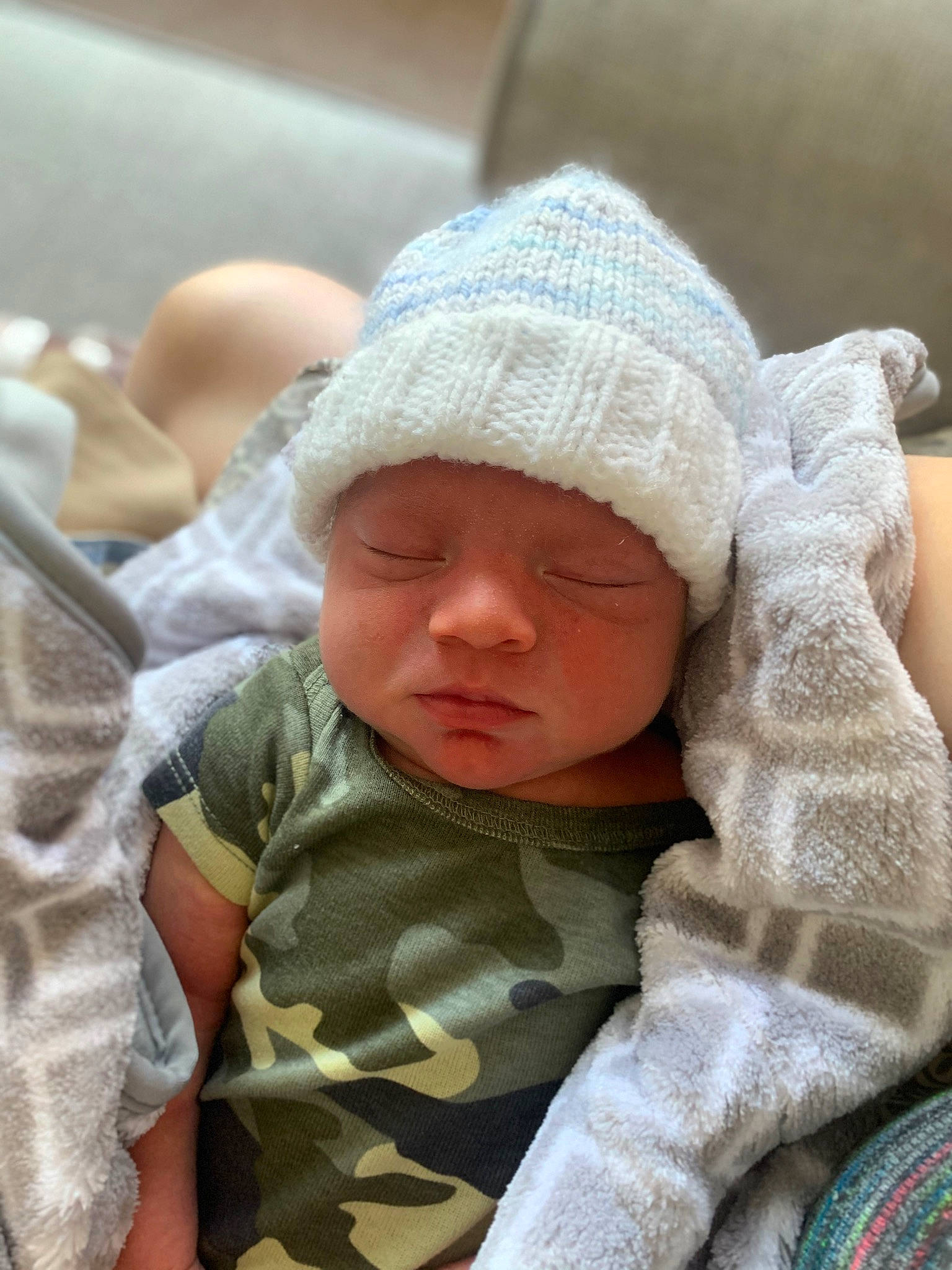Jaidyn joined the competition — help win amazing prizes! baby, baby_sleeping, baby_toddler_clothing, camouflage, cap, cheek, child, comfort, facial_expression, headgear, headwear, knit_cap, linens, military_camouflage, outerwear, pattern, person, skin, sleeve, toddler