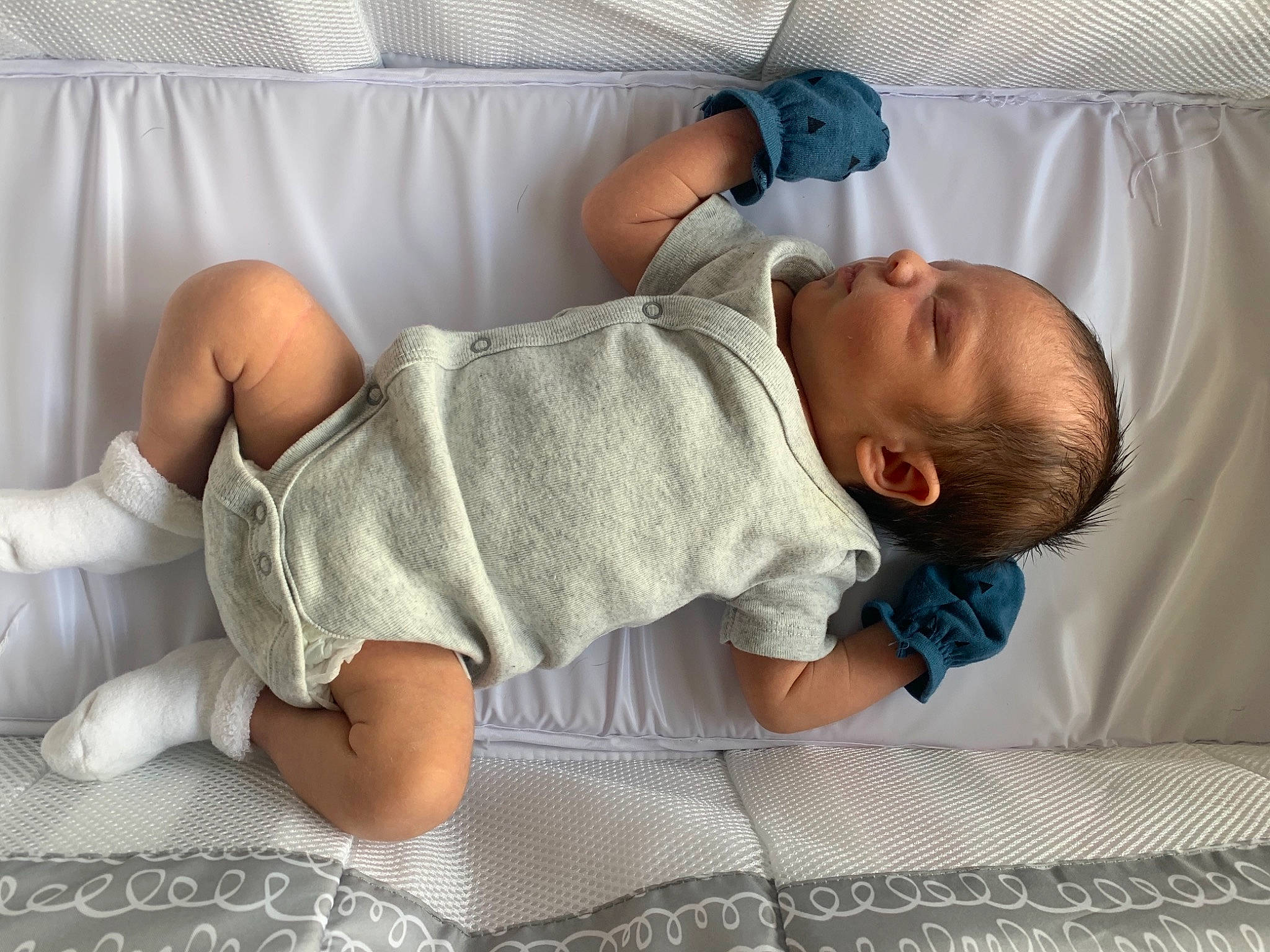 Jaidyn is registered to the contest to win money with this photo: arm, baby, baby_products, baby_safety, baby_sleeping, baby_toddler_clothing, child, comfort, eye, finger, foot, hand, human_body, human_leg, infant_bed, knee, linens, person, product, skin