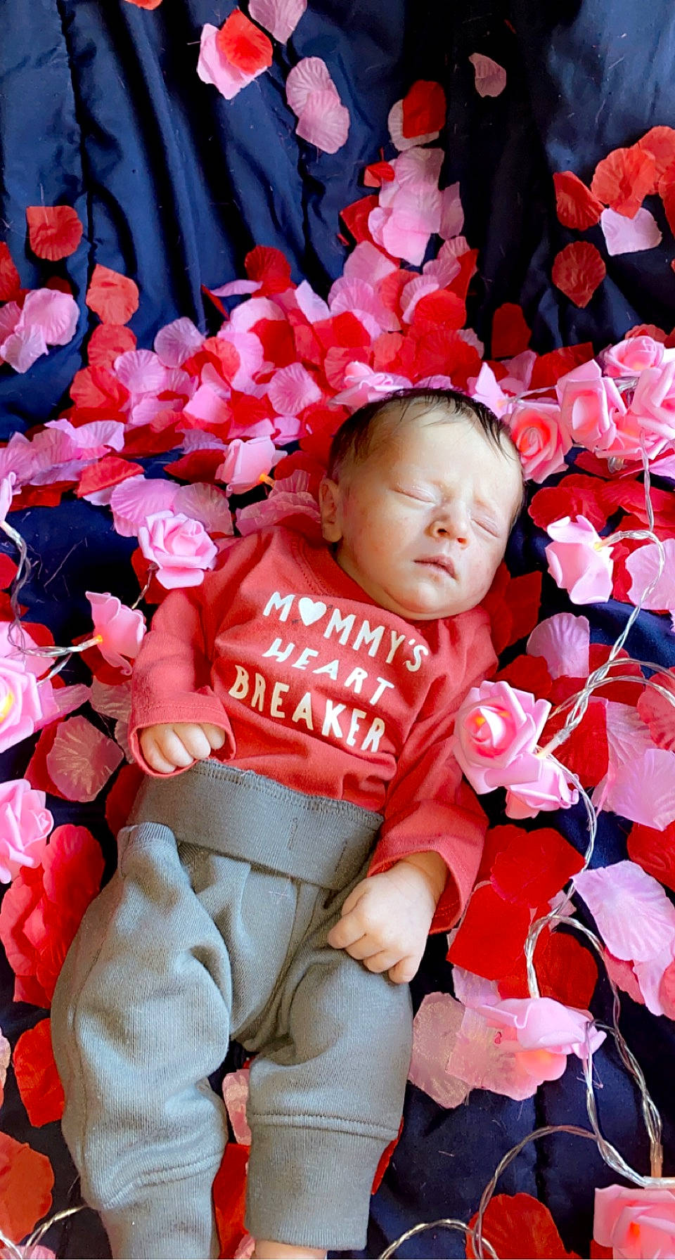 Grayson joined the competition — help win amazing prizes! baby, baby_carriage, baby_products, baby_toddler_clothing, carmine, child, event, face, flowering_plant, happy, pattern, peach, people_in_nature, person, petal, pink, plant, red, spring, textile