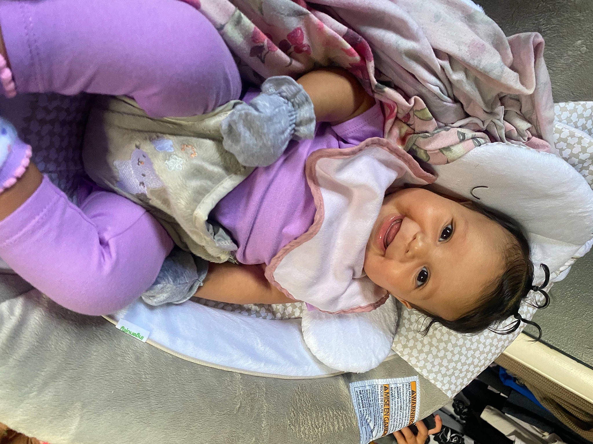 Syniah is registered to the contest to win money with this photo: baby, baby_products, baby_toddler_clothing, cheek, child, comfort, eyelash, hat, nap, person, purple, skin, sleep, smile, textile, thigh, toddler