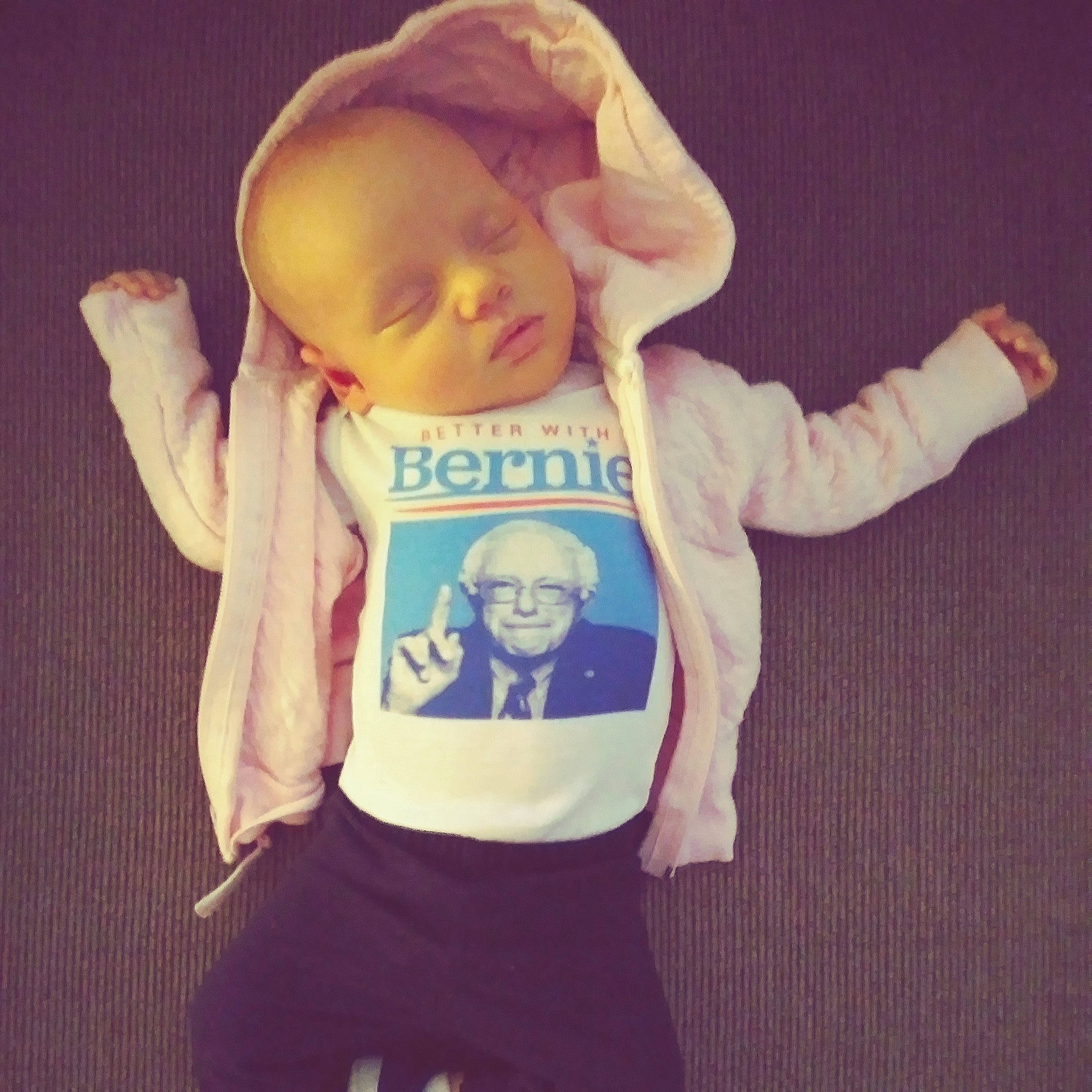 Emilie joined the competition — help win amazing prizes! arm, baby, cheek, child, cloud, cool, face, finger, forehead, gesture, hand, head, hoodie, jacket, joy, outerwear, person, product, sleeve, t_shirt