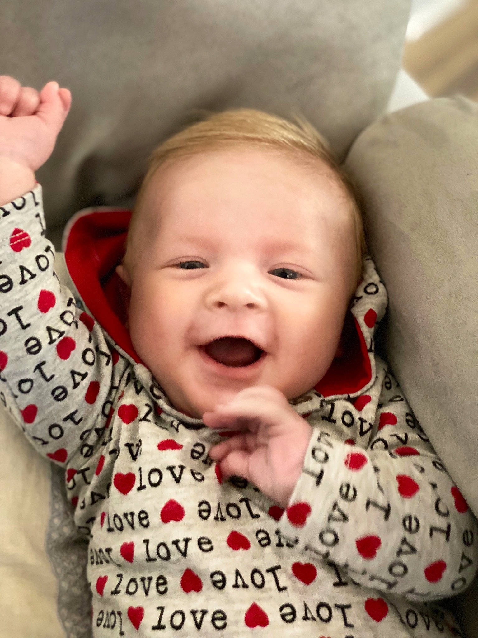 Kayden is registered to the contest to win money with this photo: baby, baby_toddler_clothing, cheek, chin, clothing, comfort, eye, face, facial_expression, gesture, happy, head, lip, mouth, nose, person, skin, sleeve, smile, textile