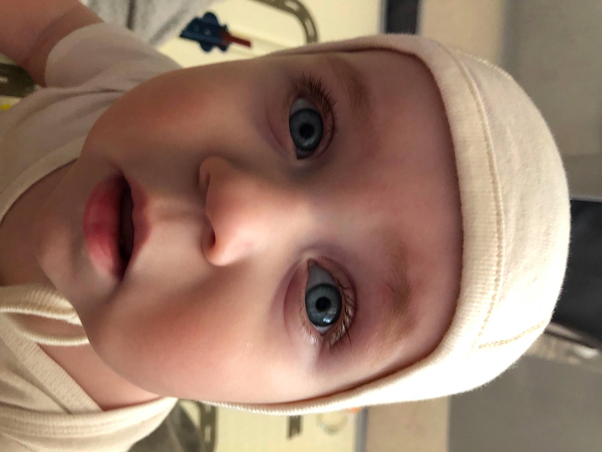 Lilly is registered to the contest to win money with this photo: baby, cheek, child, chin, close_up, ear, eye, eyebrow, eyelash, forehead, fun, headwear, iris, jaw, lip, mouth, neck, nose, person, skin