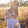 Kara is registered to the contest to win money with this photo: backlighting, beauty, brown_hair, dress, grass, grass_family, hair, hairstyle, happy, light, long_hair, people_in_nature, photograph, photography, portrait, sky, smile, spring, summer, sunlight