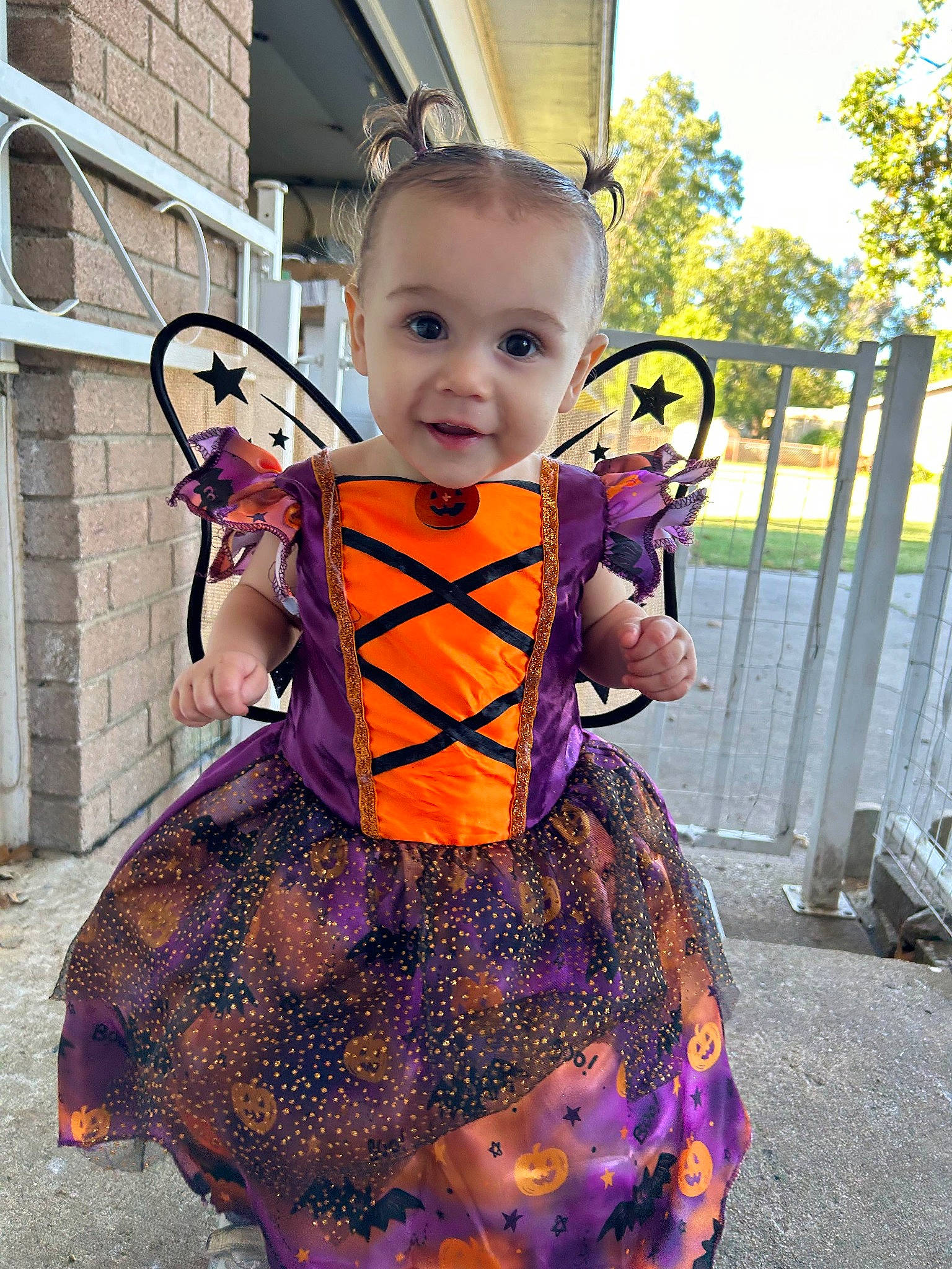 Abersyn joined the competition — help win amazing prizes! arm, baby, baby_toddler_clothing, child, dress, eye, face, fence, fun, happy, human_body, iris, orange, person, pink, purple, sky, smile, summer, toddler