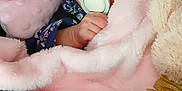 Amara-Leigh joined the competition — help win amazing prizes! baby, sleeping, pacifier, blanket, pink, hat, knitted, plush_toy, infant, cute, cozy, child, soft, resting, closeup, portrait, wrapped, hand, peaceful, indoors