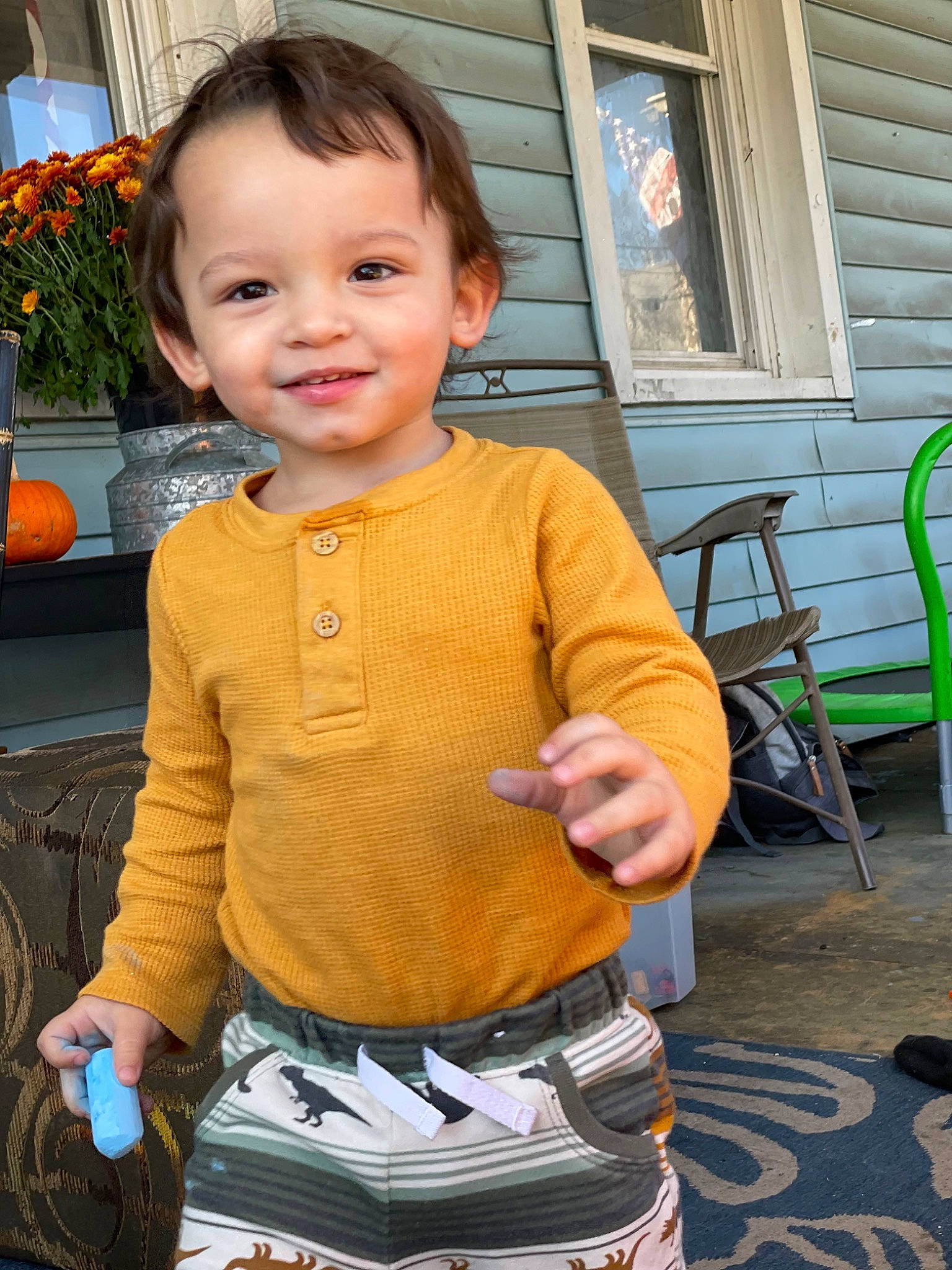 Mateo is registered to the contest to win money with this photo: baby_toddler_clothing, chair, child, eye, face, fun, grass, happy, head, joy, leisure, person, plant, shorts, sitting, sleeve, smile, tire, toddler, waist
