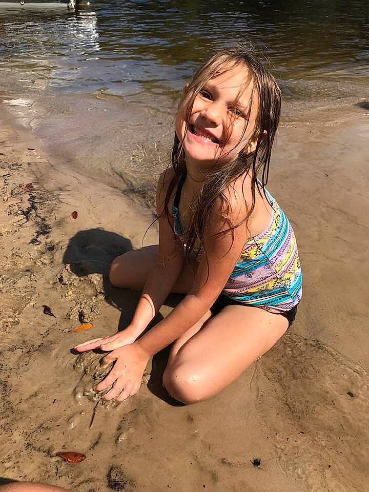 Milana is registered to the contest to win money with this photo: beauty, bikini, fawn, fun, joy, lady, leg, long_hair, mud, person, sand, smile, summer, swimwear, vacation, water