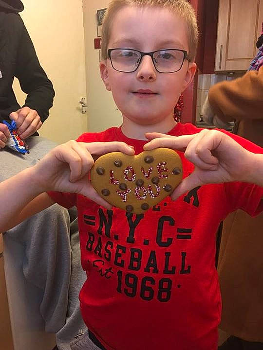 Kenzie is registered to the contest to win money with this photo: child, day, fun, glasses, organ, red