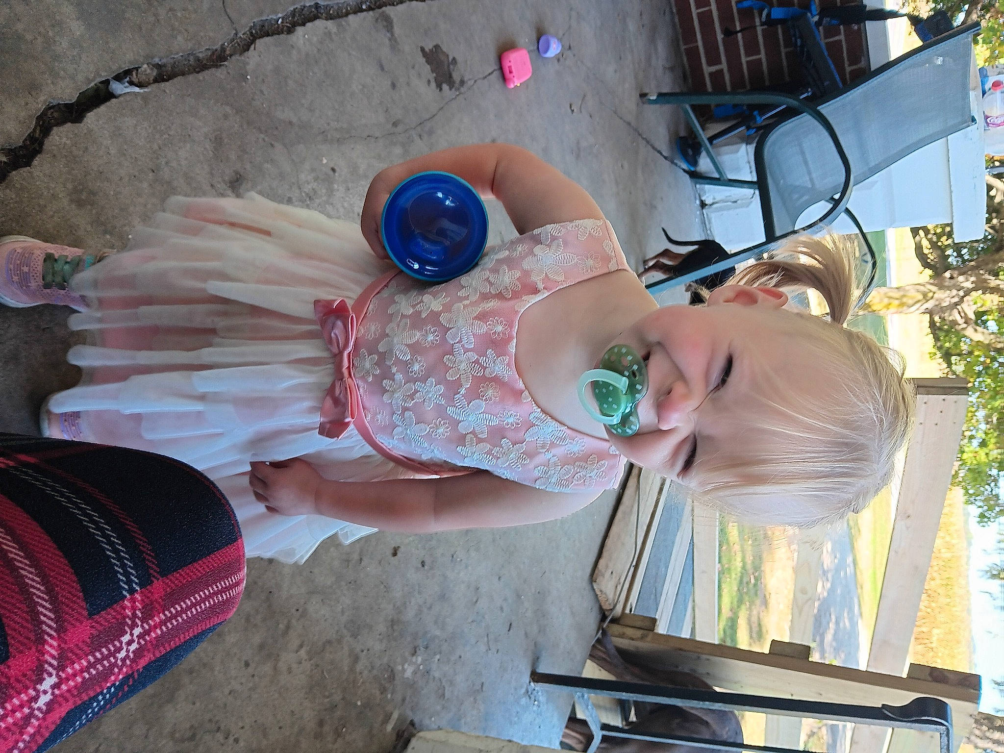 Carly is registered to the contest to win money with this photo: art, baby, child, dress, eyewear, fun, hat, pattern, person, plant, textile, toddler, vacation, wrist