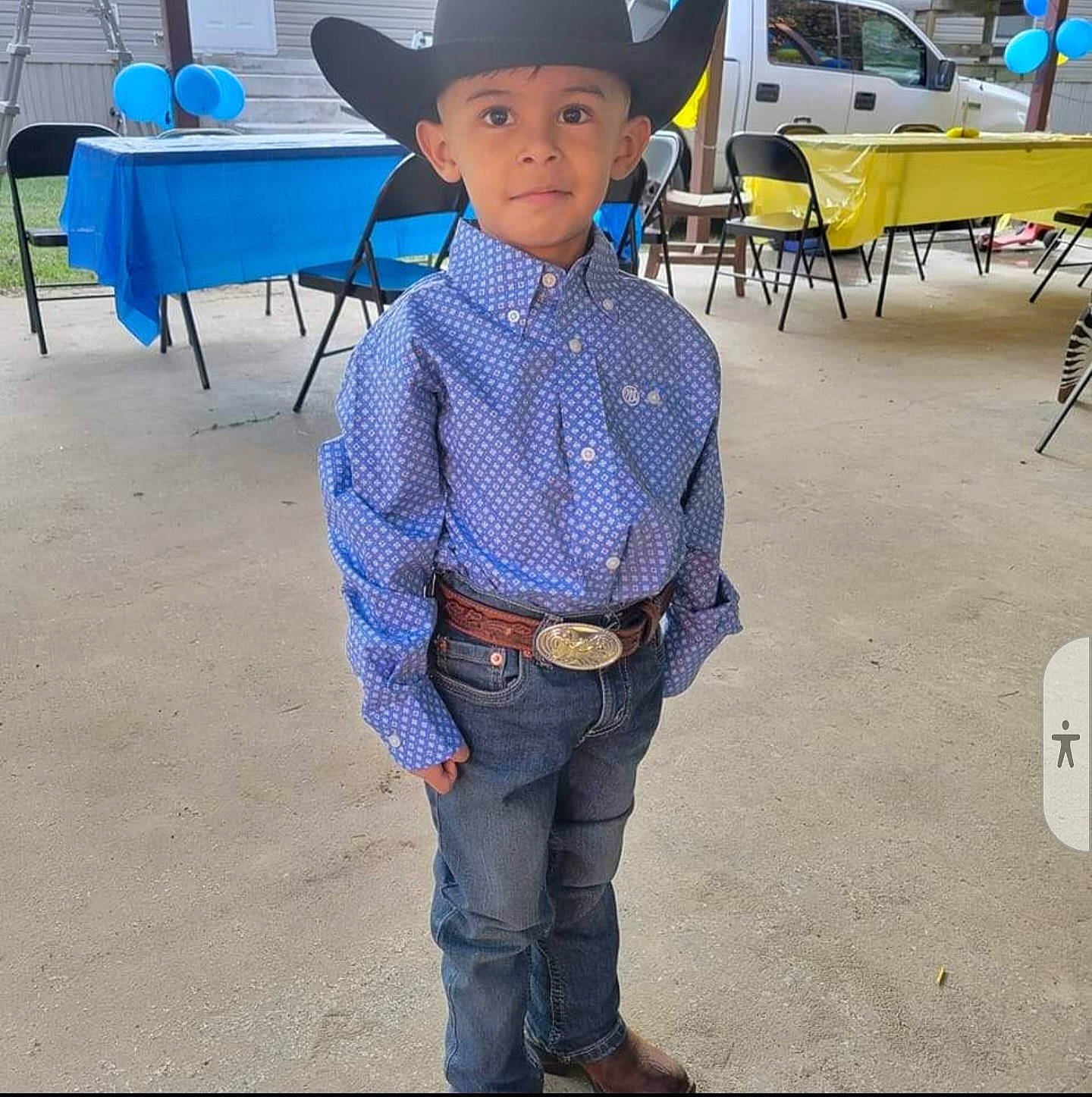 Alejandro is registered to the contest to win money with this photo: belt, chair, cowboy_hat, denim, dress_shirt, electric_blue, event, fashion_accessory, fun, hat, head, headwear, jeans, leisure, person, sitting, sun_hat, sunglasses, table, tartan