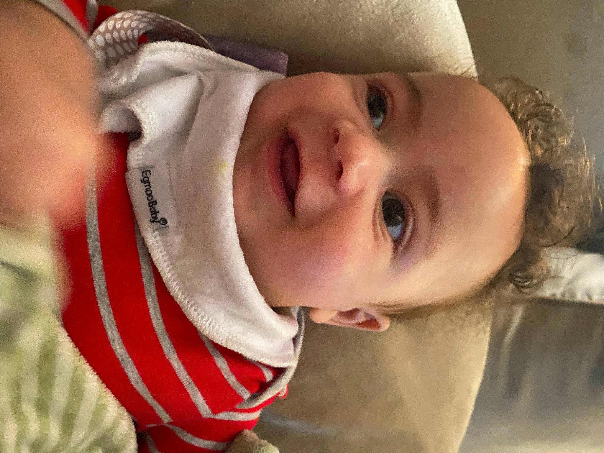 Joshua is registered to the contest to win money with this photo: baby, cheek, chin, eye, eyebrow, eyelash, face, flash_photography, happy, hat, head, headgear, iris, lip, mouth, nose, person, skin, smile, toddler