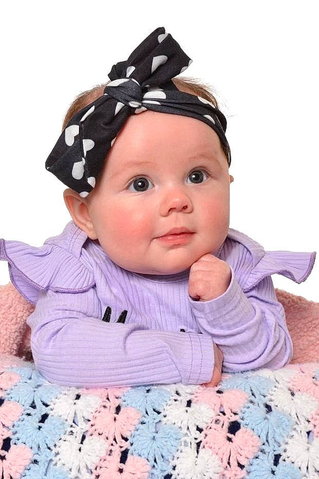 Arya is registered to the contest to win money with this photo: baby, baby_toddler_clothing, beanie, beauty, cap, cheek, child, costume_hat, fashion_accessory, fun, hair_accessory, happy, headwear, linens, magenta, pattern, person, pink, sleeve, textile