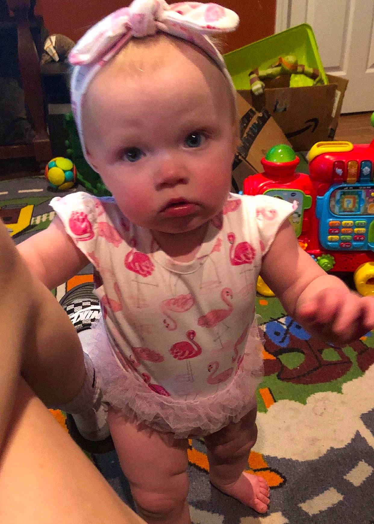 Elle joined the competition — help win amazing prizes! baby, baby_toddler_clothing, chair, cheek, child, event, eye, fun, hairstyle, happy, head, human_leg, mouth, party, person, play, product, sitting, skin, thigh