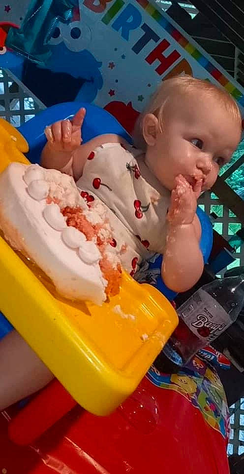 Elle is registered to the contest to win money with this photo: baby, baby_products, baby_toddler_clothing, baby_toys, blue, cheek, child, event, fun, happy, leisure, person, plastic, play, recreation, sitting, toddler