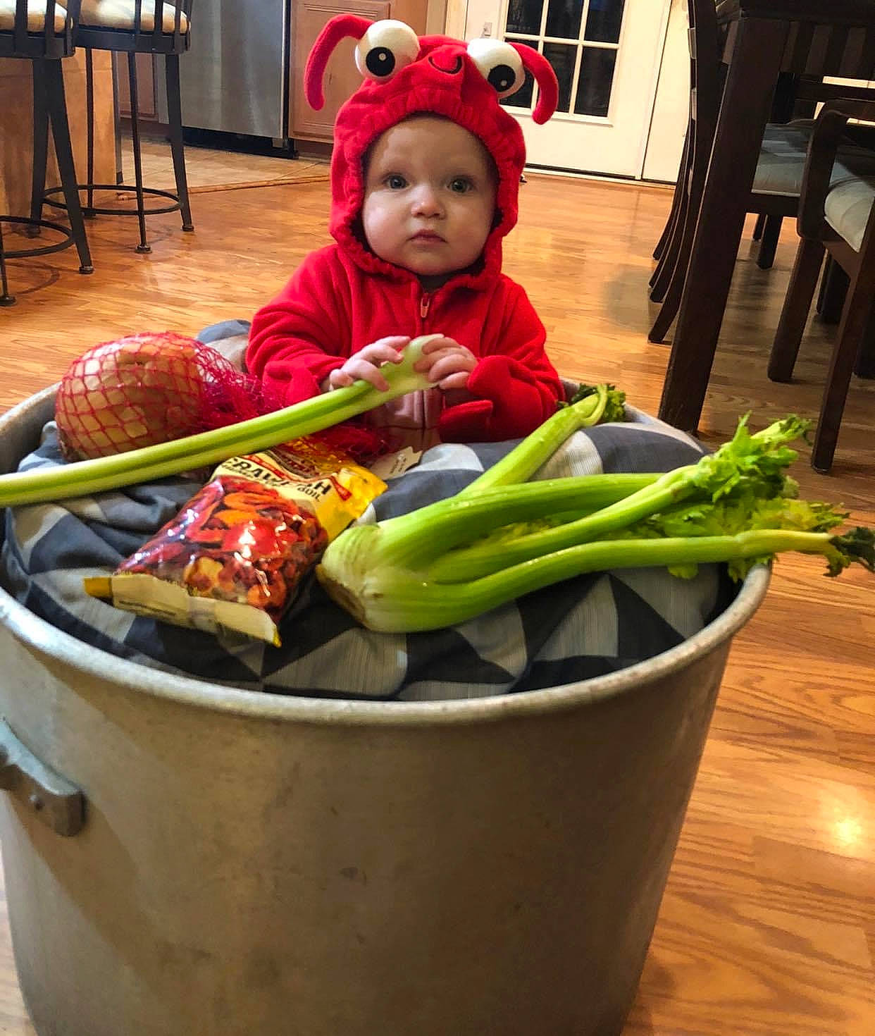Elle is registered to the contest to win money with this photo: baby, baby_toddler_clothing, bell_peppers_and_chili_peppers, capsicum, chair, child, comfort_food, cuisine, dish, food, headwear, ingredient, leaf_vegetable, local_food, market, natural_foods, peperoncini, person, produce, toddler