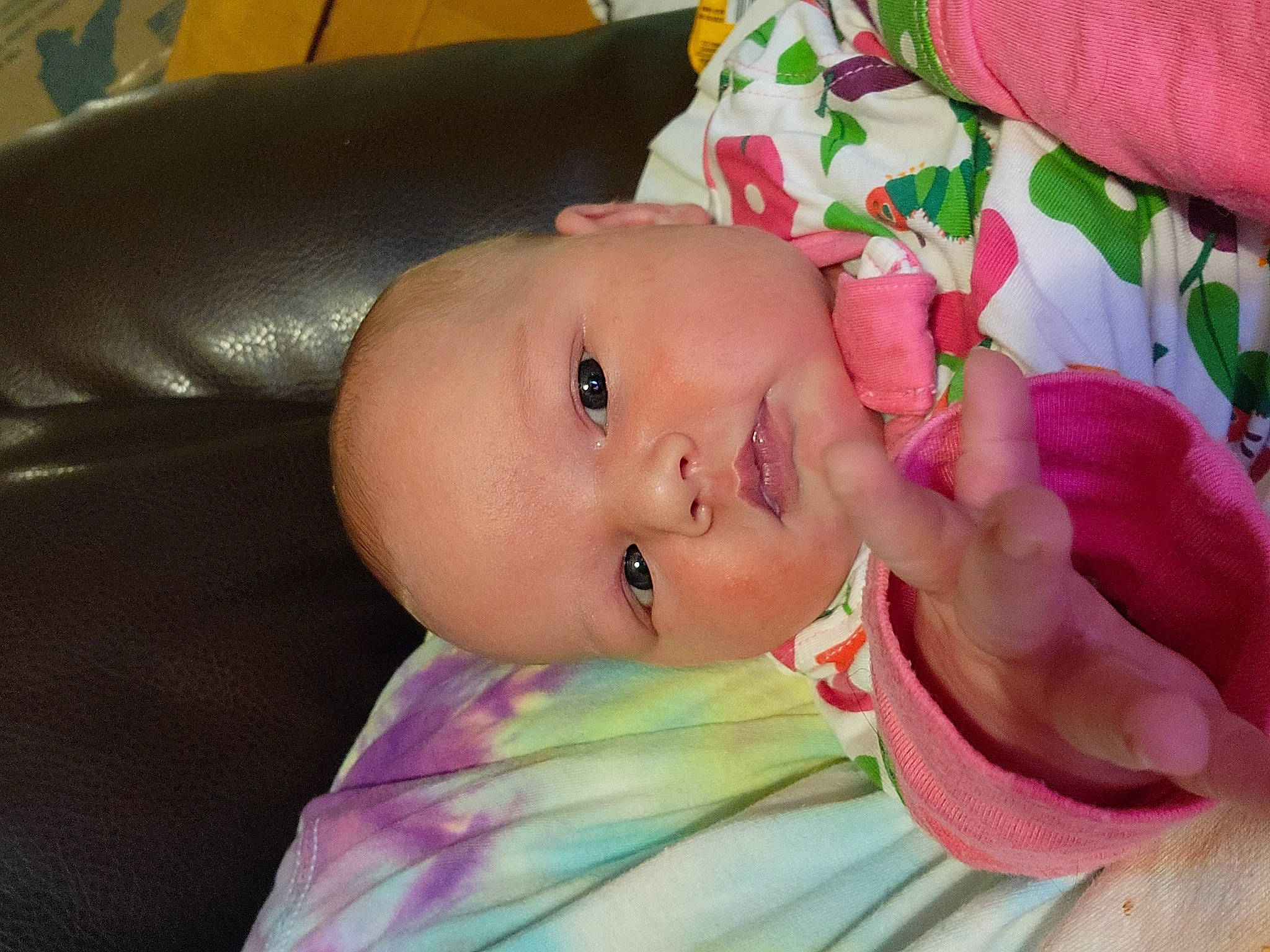 Elsa is registered to the contest to win money with this photo: baby, baby_products, baby_toddler_clothing, cheek, child, comfort, eye, eyebrow, eyelash, happy, head, iris, linens, lip, magenta, nail, nose, person, pink, skin