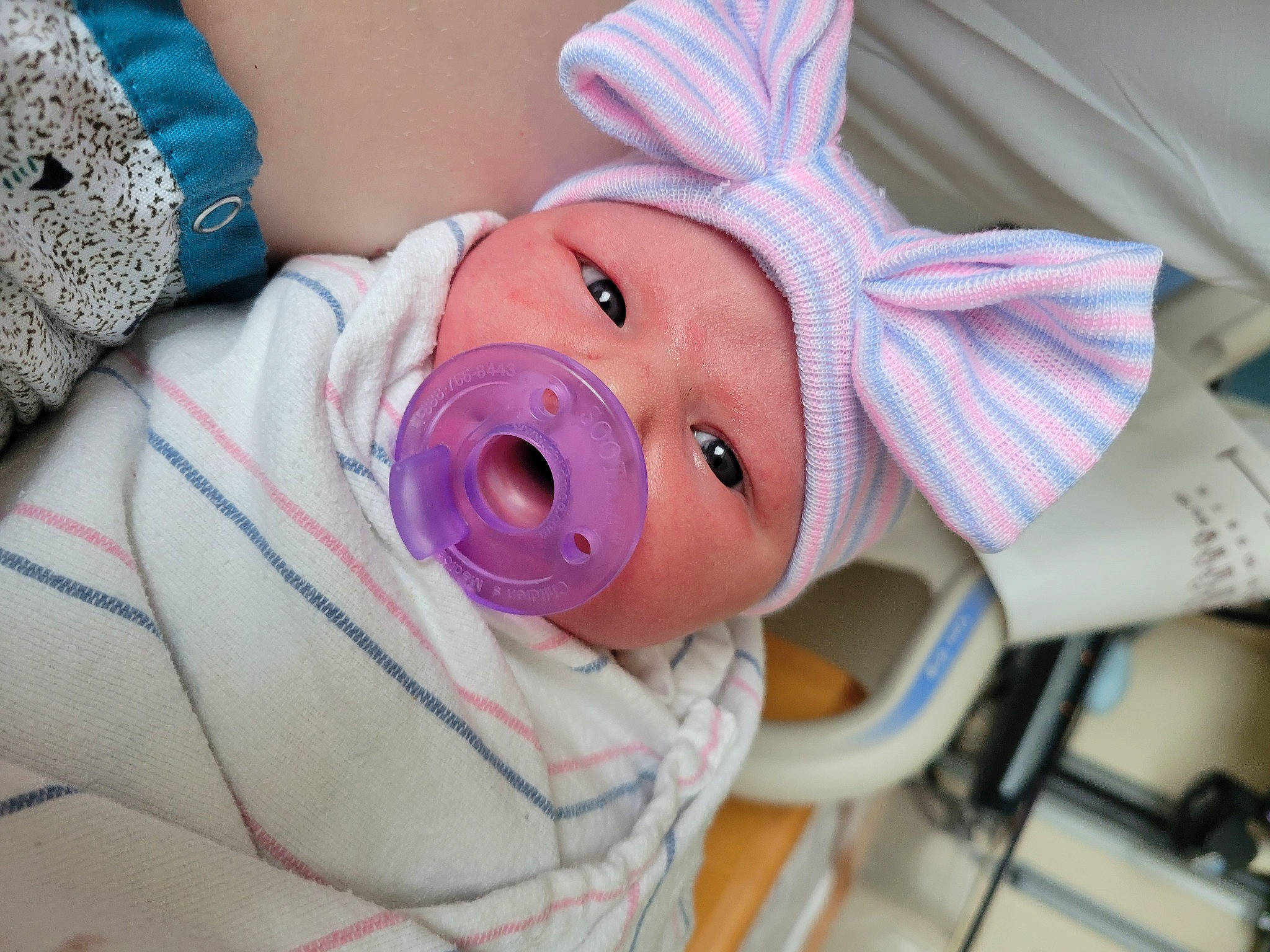 Elsa is registered to the contest to win money with this photo: baby, baby_products, baby_toddler_clothing, cheek, child, eye, eyelash, happy, head, headgear, lip, nose, person, pink, plush, purple, stuffed_toy, textile, toddler, toy