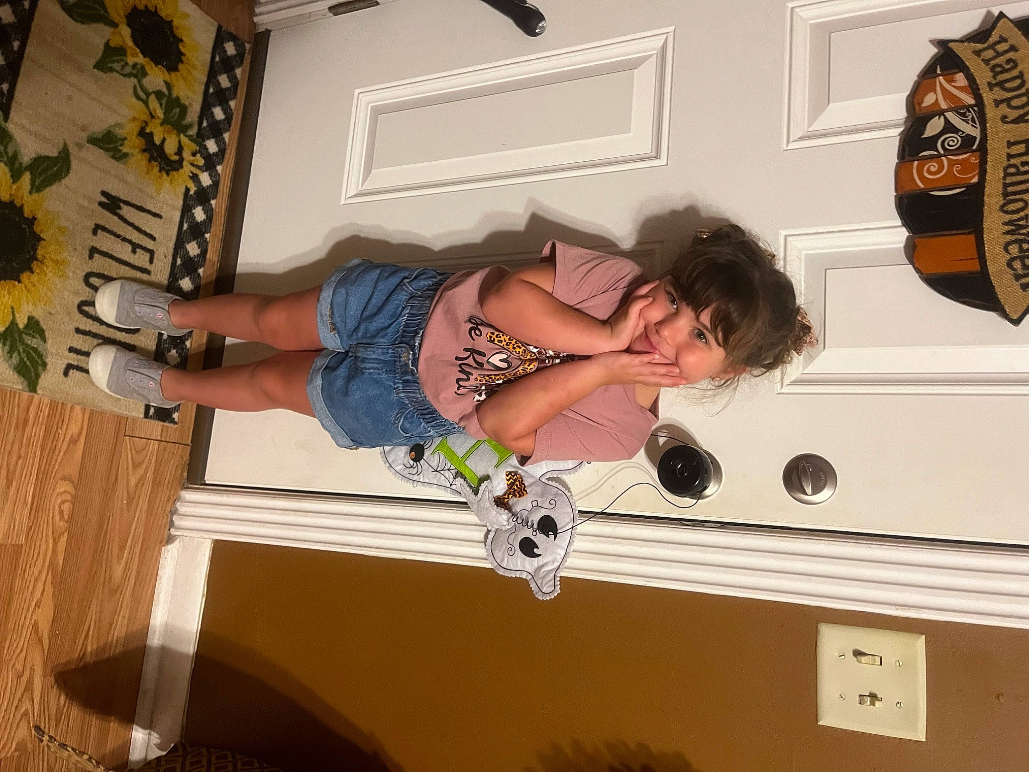Presleigh is registered to the contest to win money with this photo: ceiling, comfort, elbow, flooring, fun, hardwood, human_leg, knee, logo, person, plant, room, stairs, t_shirt, thigh, walking_shoe, wood, wrist