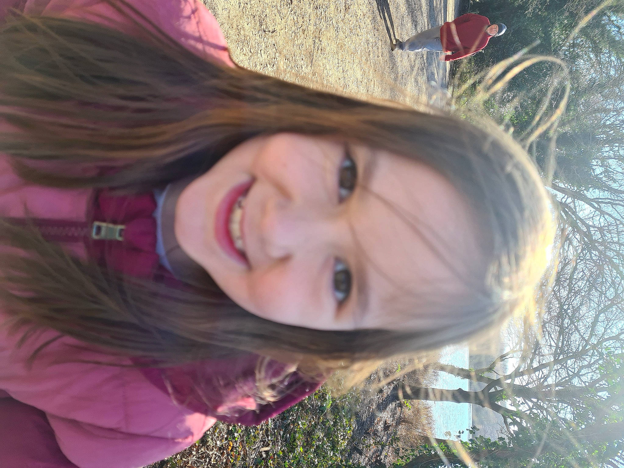 Zara is registered to the contest to win money with this photo: chin, eye, eyelash, facial_expression, grass, hair, hairstyle, happy, head, headwear, human, iris, joy, lip, mouth, nose, organ, person, pink, plant