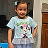 Linda joined the competition — help win amazing prizes! blue, chair, child, cute, fashion, furniture, girl, hair_accessory, happy, home, indoor, jewelry, minnie_mouse, person, playful, portrait, shorts, smiling, standing, tshirt