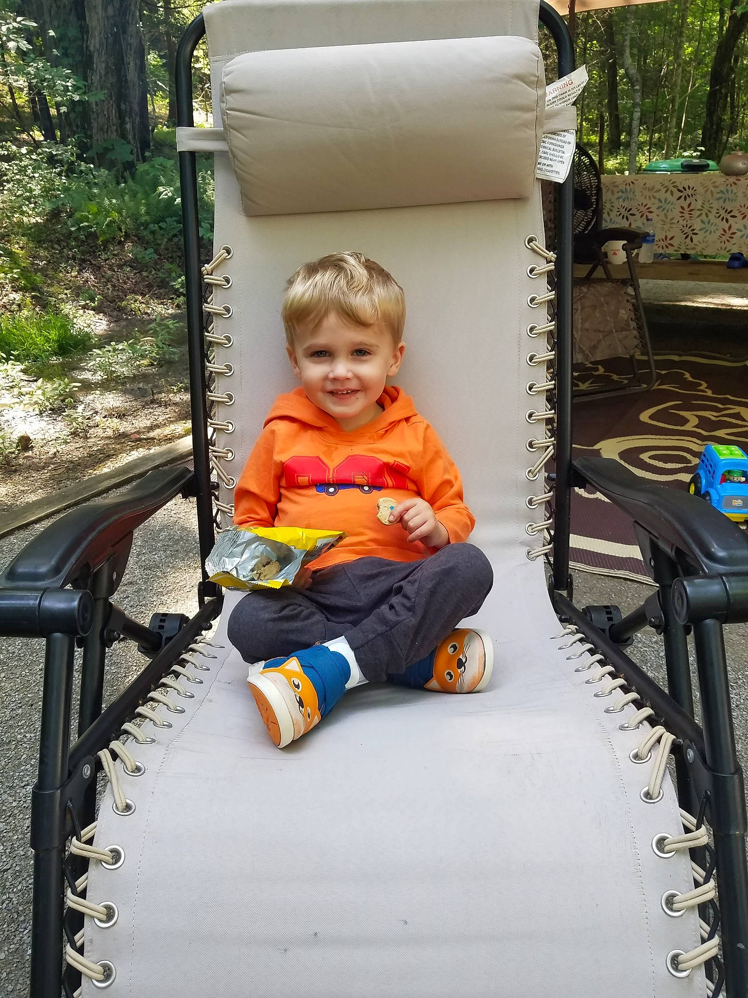 Titus is registered to the contest to win money with this photo: child, joy, person, sitting, swing, toddler, tree, vacation