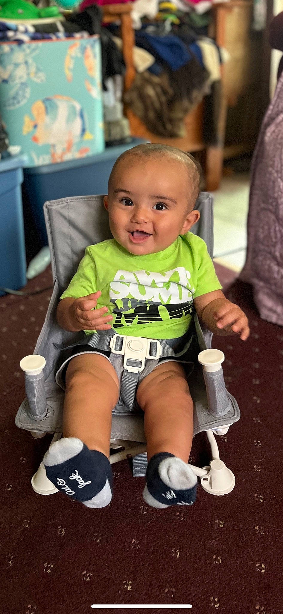 Desmond joined the competition — help win amazing prizes! baby, baby_toddler_clothing, chair, cheek, child, eye, face, flooring, happy, head, knee, person, product, shoe, shorts, skin, sleeve, smile, snapshot, sneakers