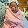 Alyssa Nevaeh joined the competition — help win amazing prizes! newborn, baby, smiling, wrapped, blanket, pink_blanket, headband, white_bow, hospital, bed, wooden_floor, infant, cute, sleeping, child, person, portrait, indoors, healthcare, resting